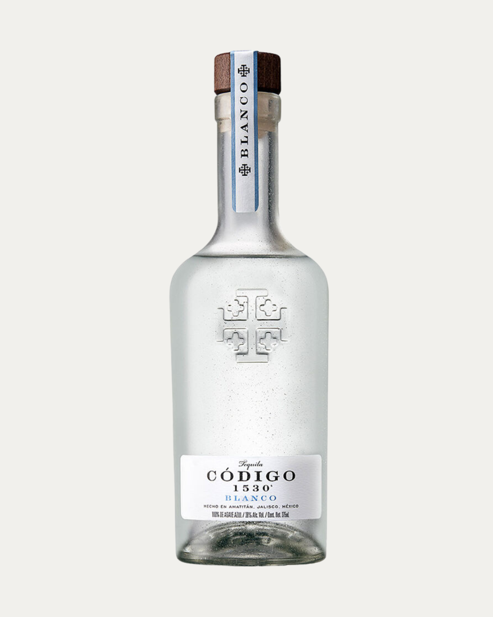 Botella de tequila Código 1530 presentada en envase individual de alta calidad